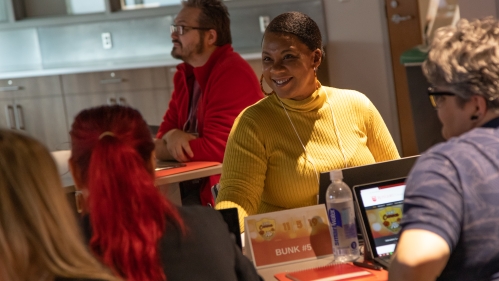 Smiling woman at table